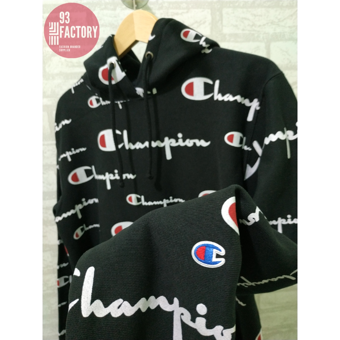 black champion hoodie with champion all over it