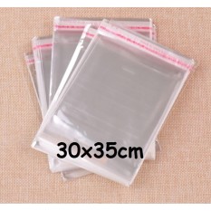 Kantong Plastik Opp Seal Lem Perekat Kemasan Baju Kaos Celana 30x35cm