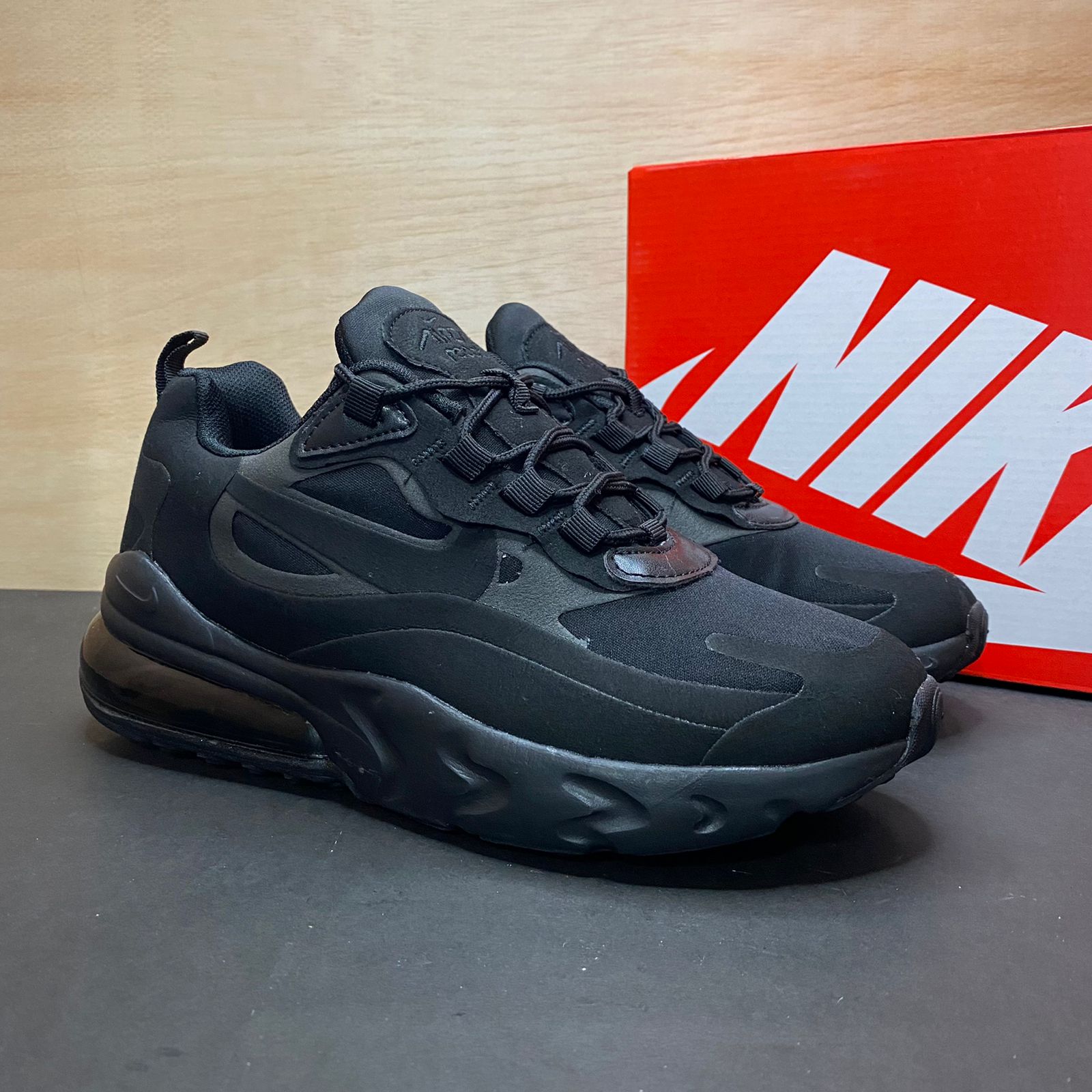 nike air max react all black
