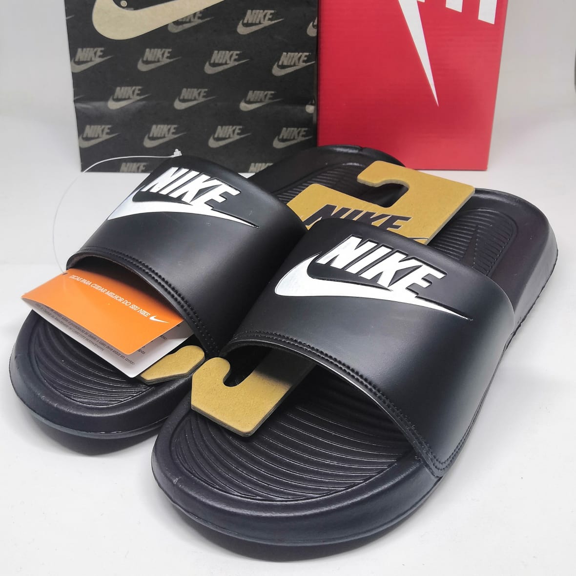 nike benassi tag