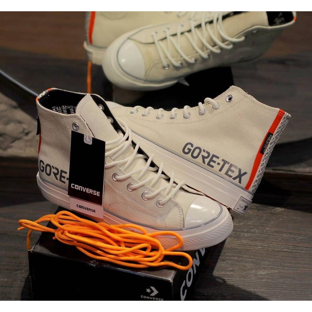 cream colored chucks