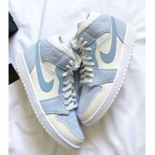 jordans mid 1 light blue