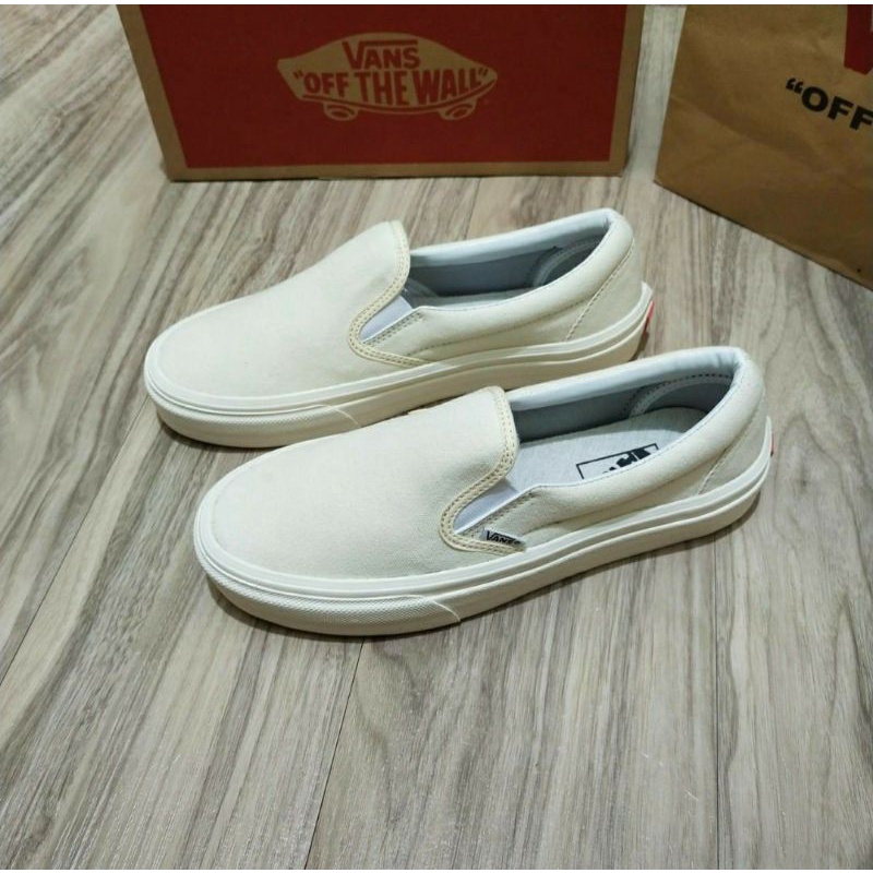 slip on cream vans