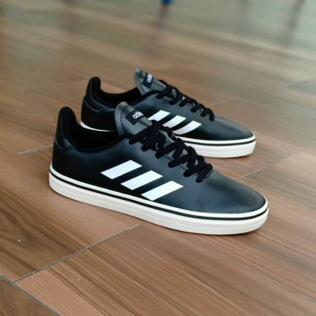 white leather adidas