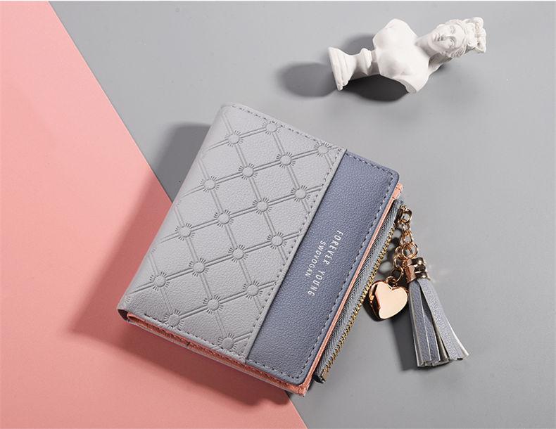 Dompet Wanita Korean version of the new ladies short wallet stitching contrast color short wallet tassel zipper multi-card position