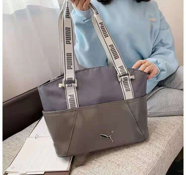 Puma marnie tote online bag