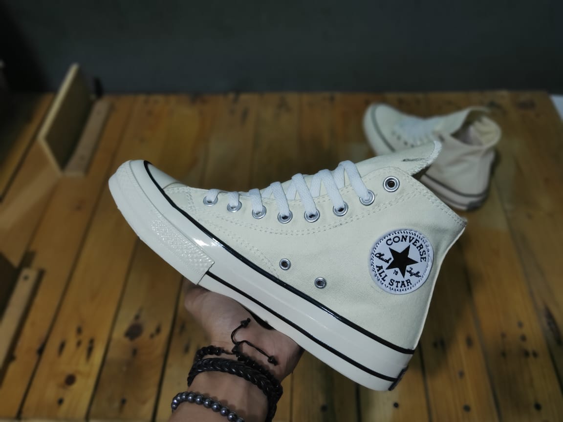 cream colored chucks