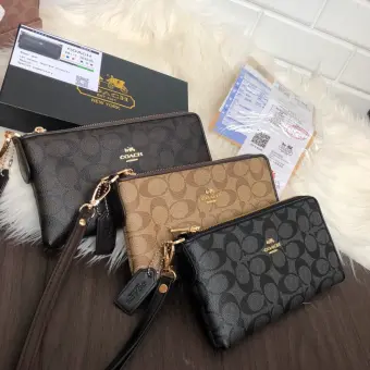harga pouch coach