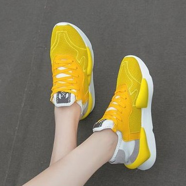 yellow training shoes